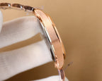 Rose gold Omega wristwatch case side view with polished bezel on white cloth