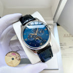 Wristwatch with blue dial and blue leather strap, silver-tone round case