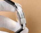 Omega watch side profile with metal case and crown; black leather strap.