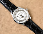Omega watch with silver case, black leather strap, and multi-dial white face.
