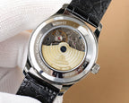 Omega watch caseback with visible movement and engraved text; black leather strap.