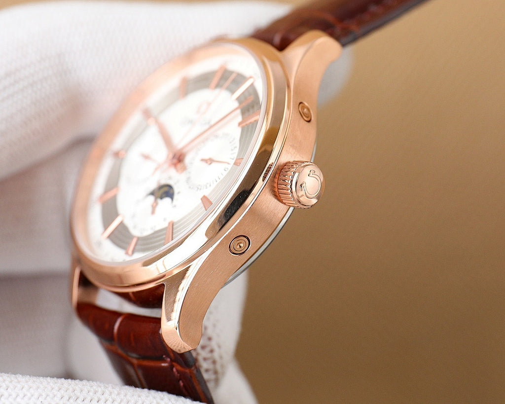 Omega wristwatch with rose-gold case and brown leather strap, side view and crown