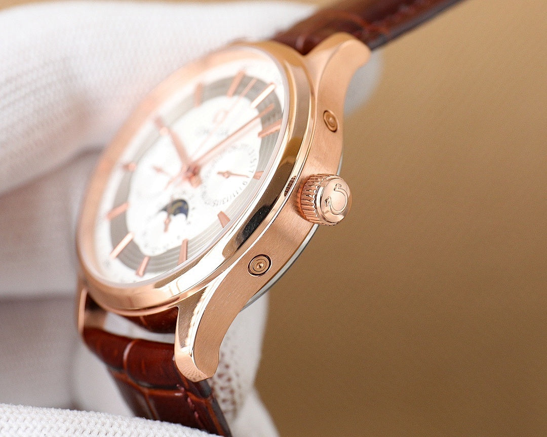 Omega wristwatch with rose-gold case and brown leather strap, side view and crown