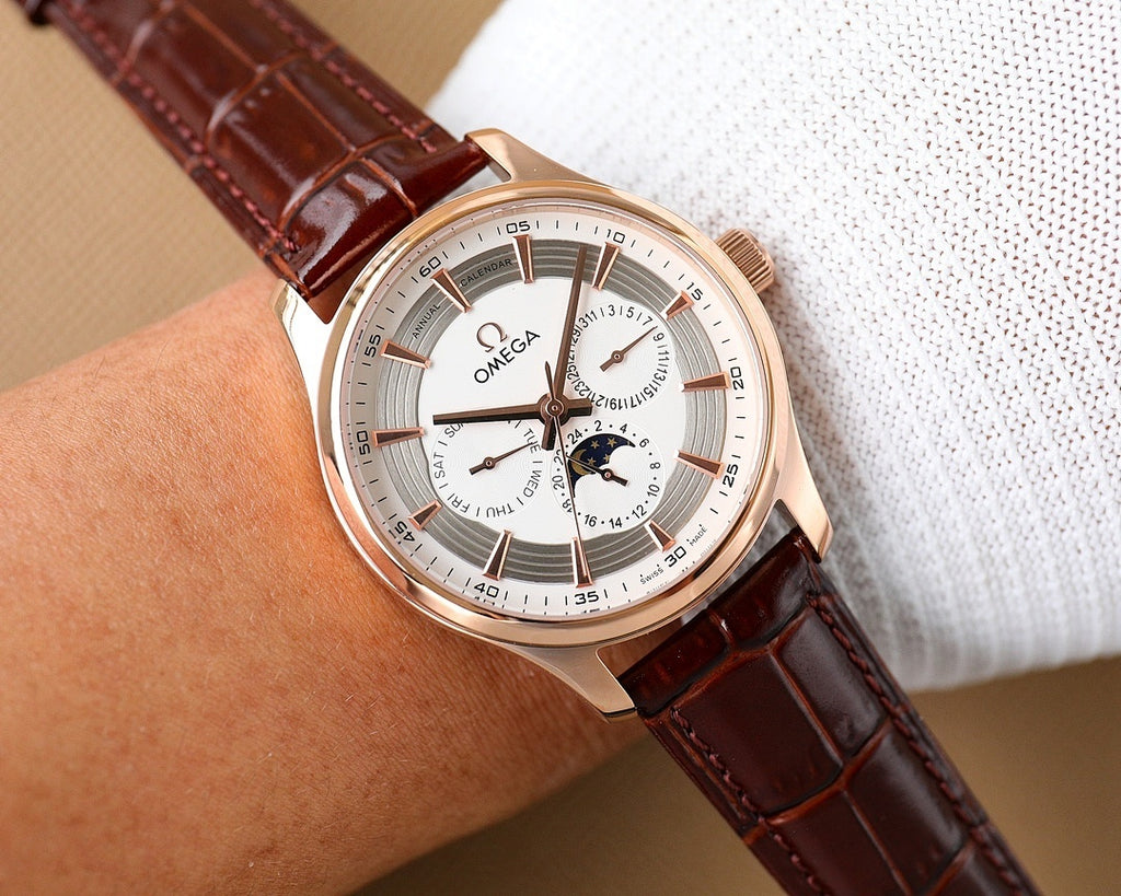 Omega wristwatch with rose-gold case, white dial, brown leather strap and subdials