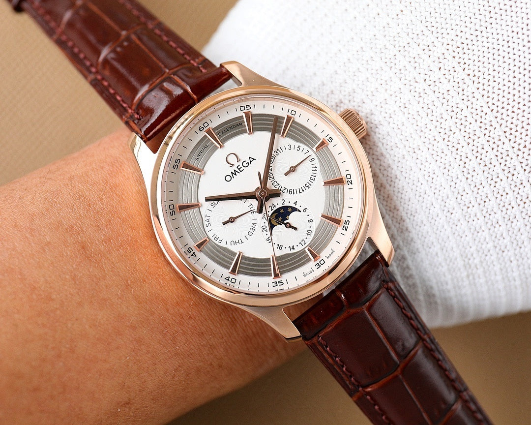 Omega wristwatch with rose-gold case, white dial, brown leather strap and subdials