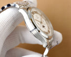 Omega watch profile with silver case and white dial on stainless steel bracelet