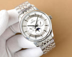 Omega watch close-up with silver case, white dial, subdials, and baton hour markers