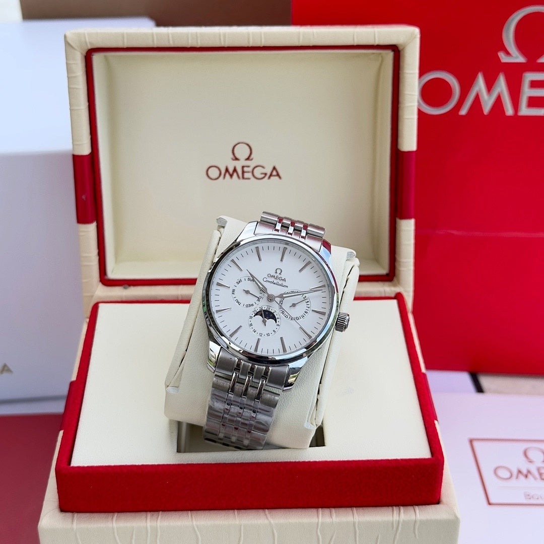 Silver-tone wristwatch with white dial and metal link bracelet in open box