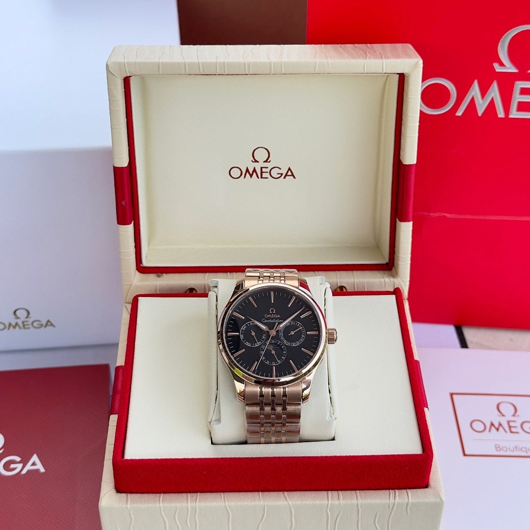 Silver-tone wristwatch with black dial and metal link bracelet in display box