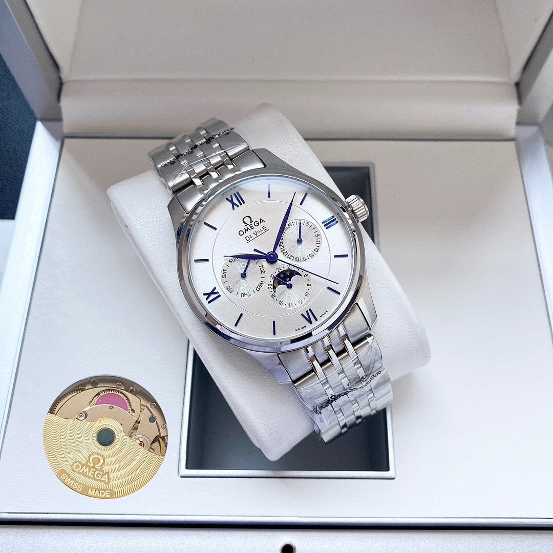 Omega wristwatch with white dial and silver metal bracelet on a white watch cushion
