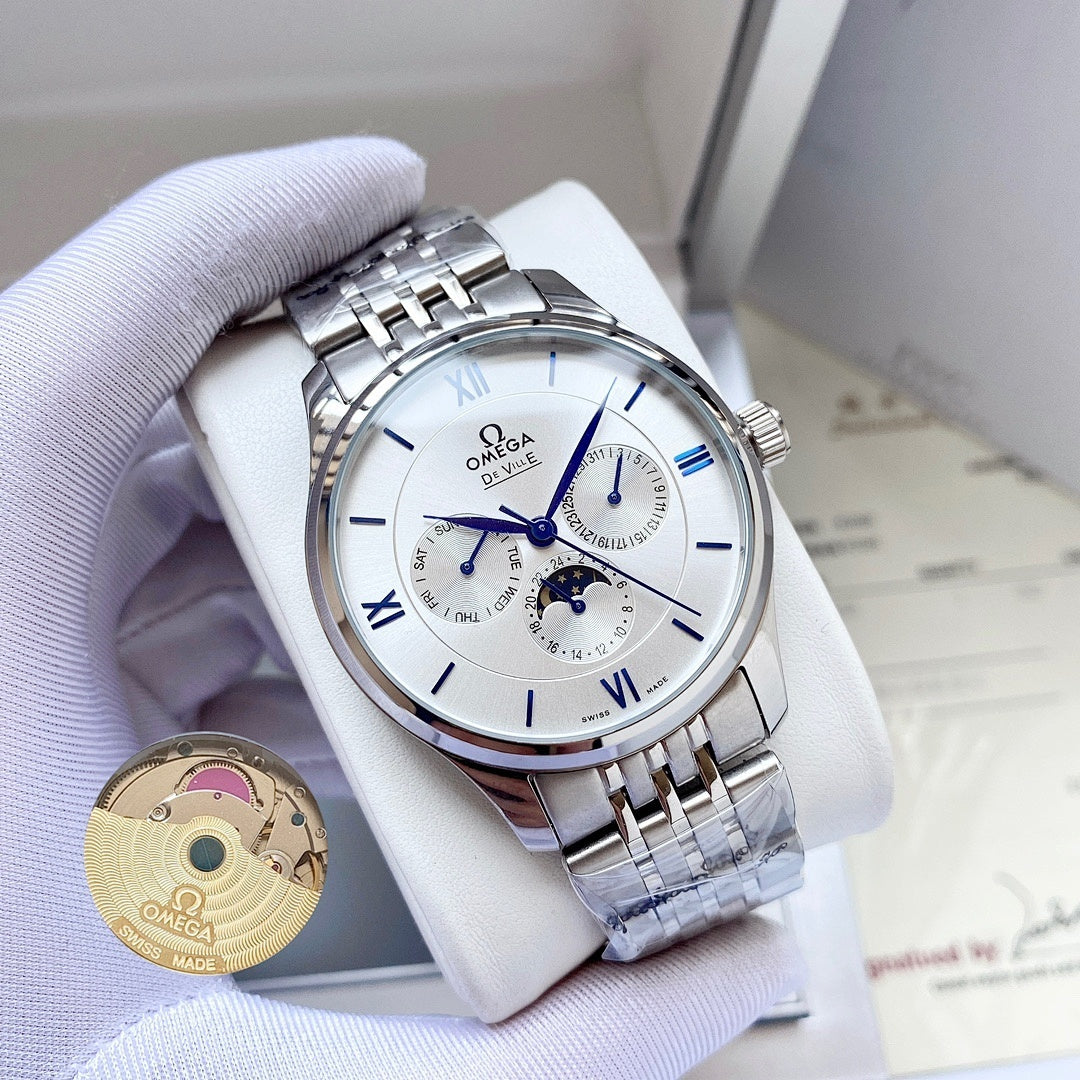 Omega wristwatch with white dial and silver metal bracelet on a white display cushion