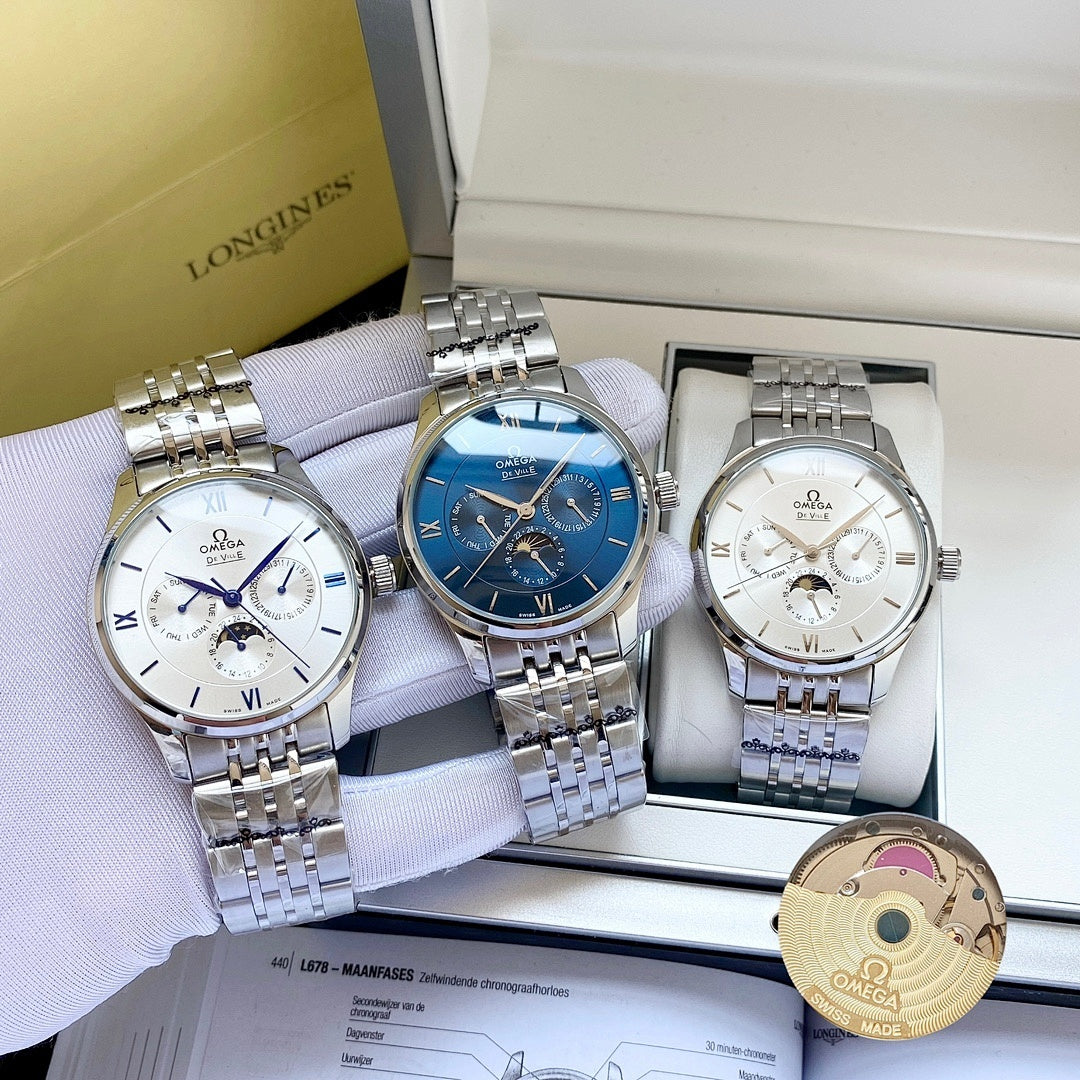 Set of three Omega wristwatches with silver metal bracelets in a white display box