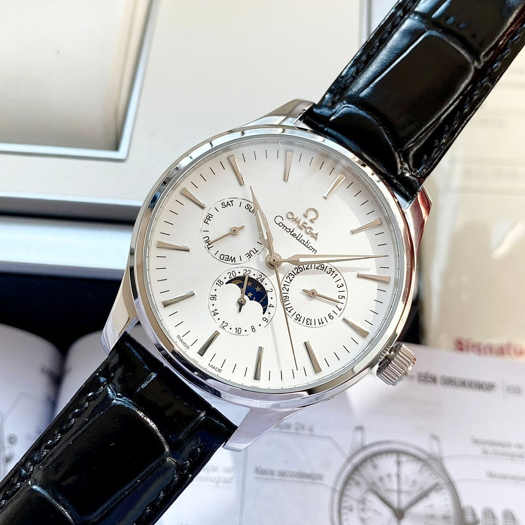 Omega wristwatch with white dial and black leather strap, silver case, subdials