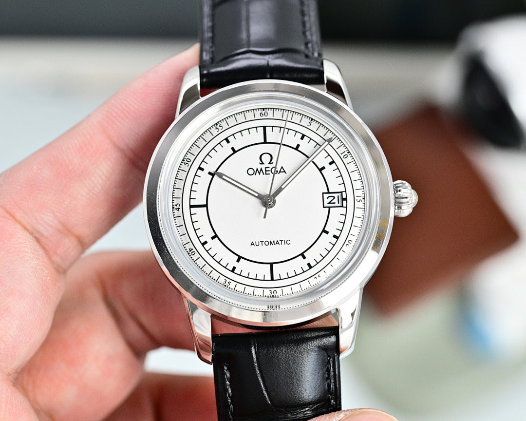 Automatic watch with white dial, silver case, black leather strap, and date marker