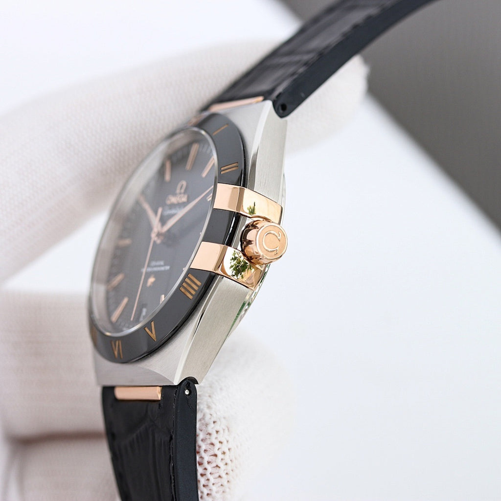 Omega wristwatch side profile with dark dial, black leather strap, gold-tone crown.