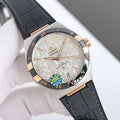Omega wristwatch with silver dial, gold-tone bezel, black leather strap.