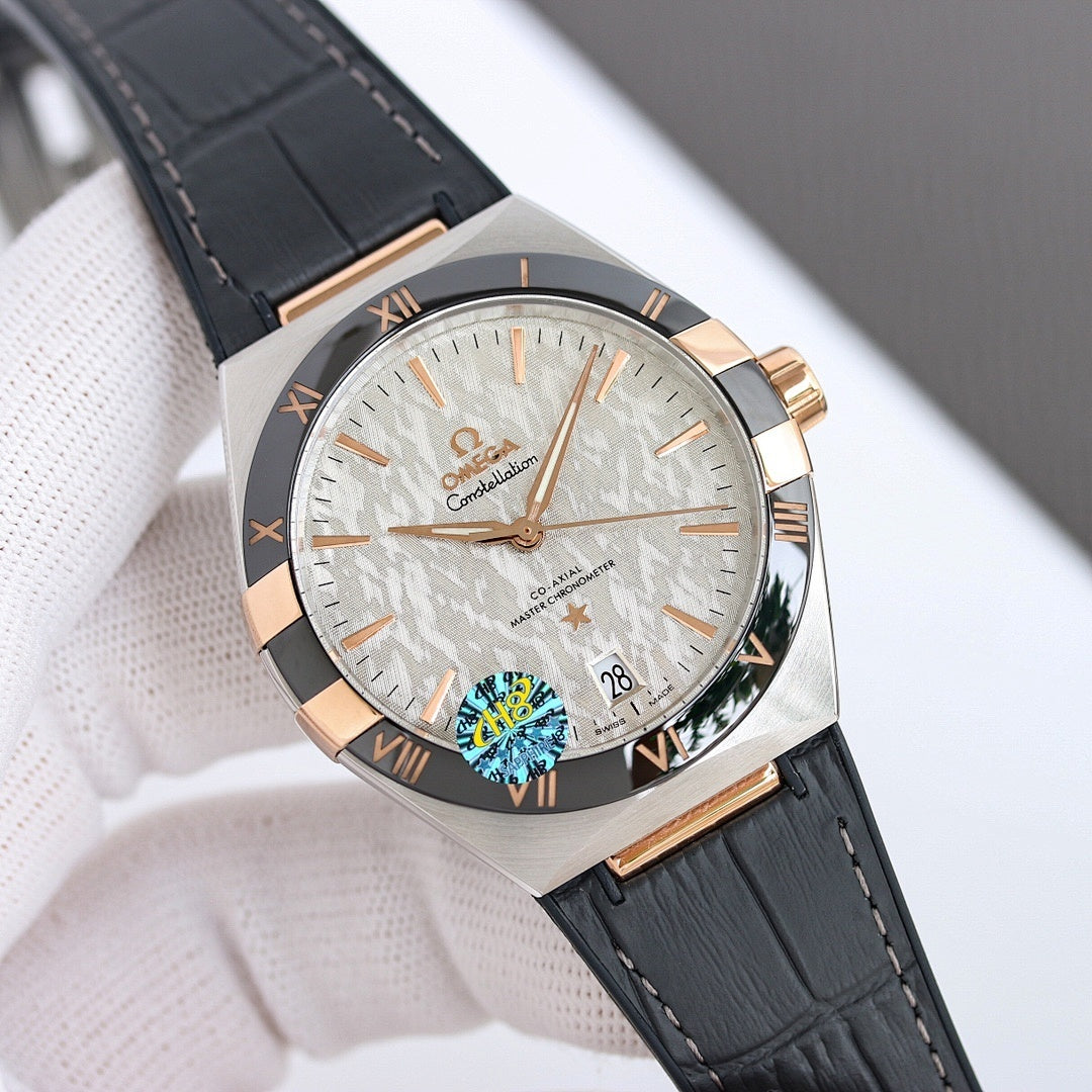 Omega wristwatch with silver dial, gold-tone bezel, black leather strap.