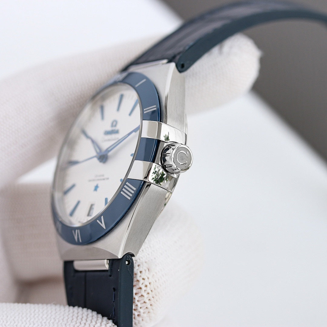 Omega watch side profile with silver case, blue leather strap, light dial with blue details
