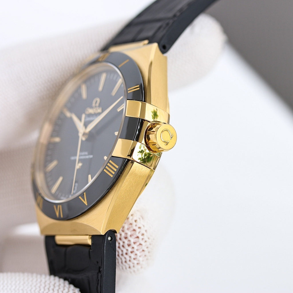 Omega wristwatch side view with gold case and black leather strap