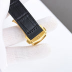 Omega wristwatch underside view with black leather strap and gold buckle