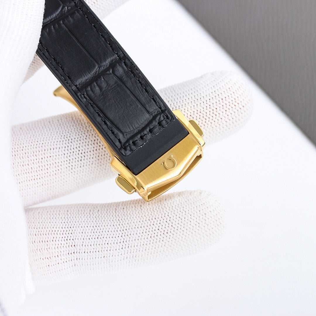 Omega wristwatch underside view with black leather strap and gold buckle