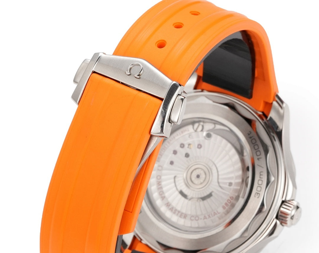 Omega watch with orange silicone strap and silver case, crown and caseback detail