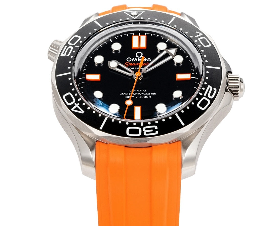 Omega diving watch front view with black dial, orange bezel markers, orange silicone strap