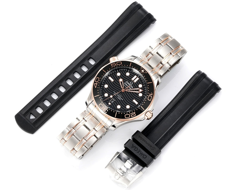 Omega stainless steel watch with black rubber straps and black dial, angled top view