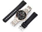 Omega stainless steel watch with black rubber straps and black dial, angled top view