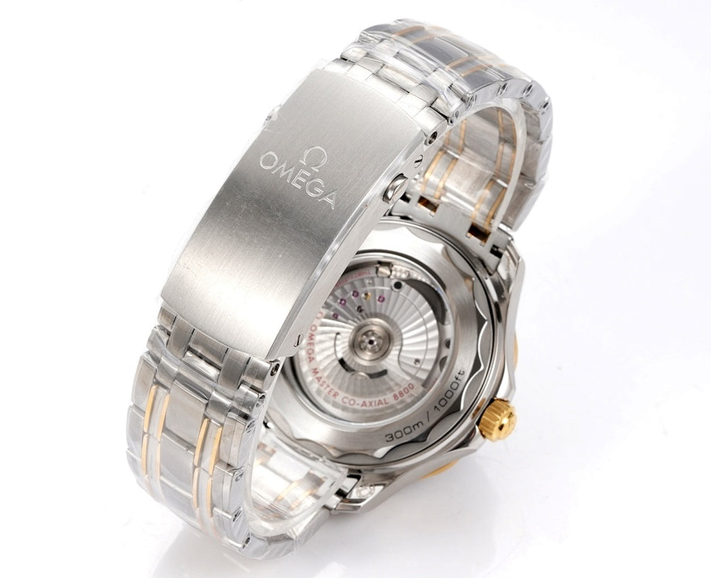 Omega two-tone dive watch side view with silver case, gold accents, metal bracelet