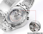 Steel diver watch caseback with movement detail and crown at right