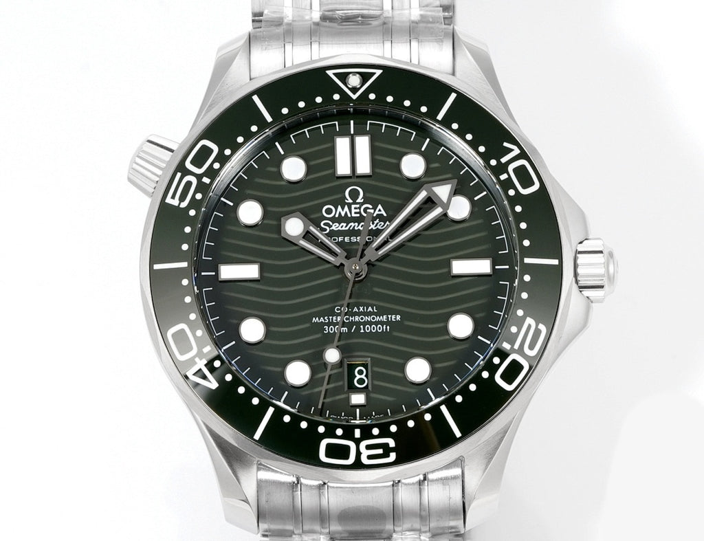 Stainless steel diver wristwatch front view with green dial and day-date window