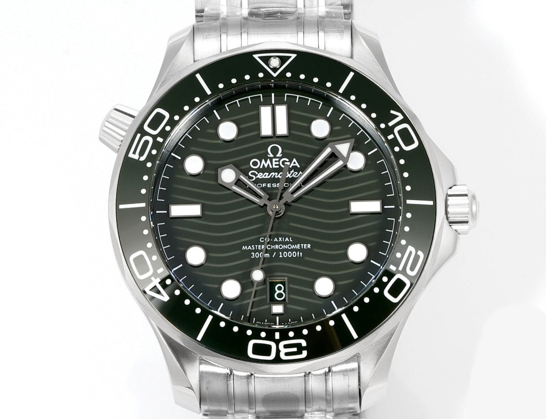 Stainless steel diver wristwatch front view with green dial and day-date window