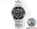 Stainless steel diver wristwatch with green dial and rotating bezel, metal bracelet