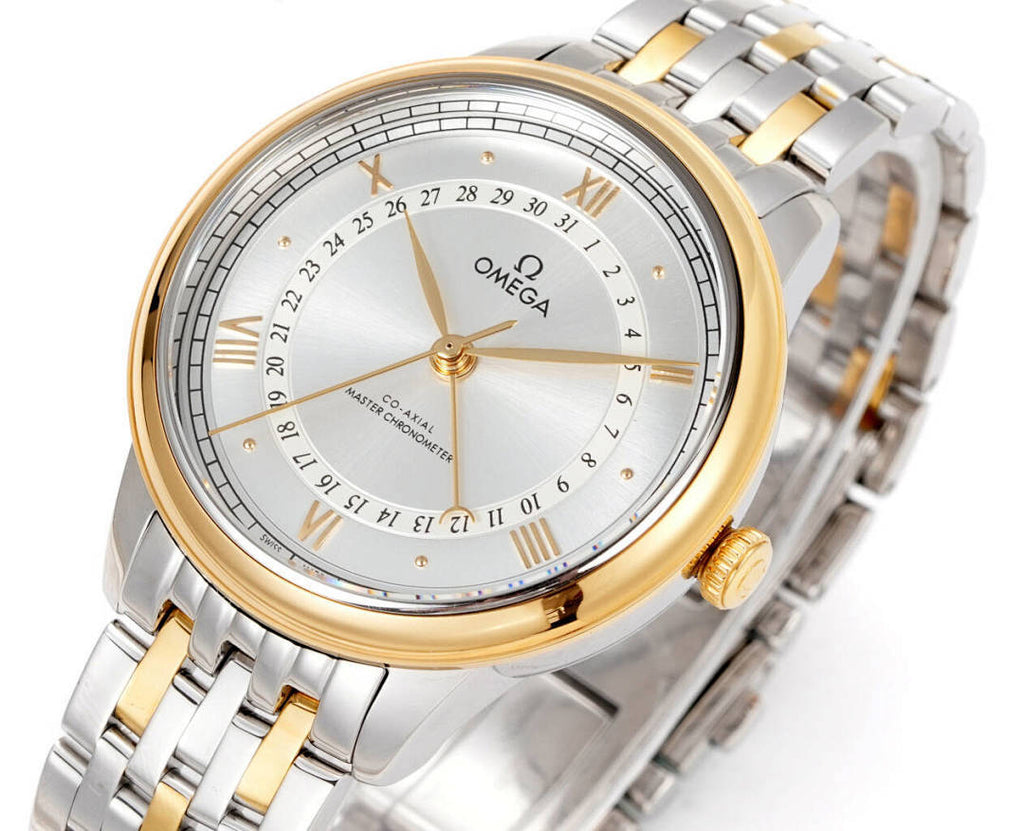 Two-tone wristwatch with white dial, gold bezel, and stainless steel bracelet