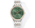Two-tone wristwatch with green dial, gold bezel, and polished link bracelet