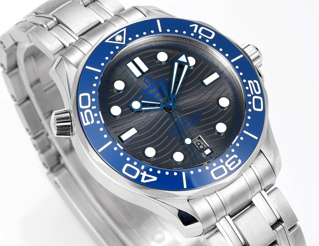 Omega watch close-up from side, blue dial and bezel, stainless bracelet links