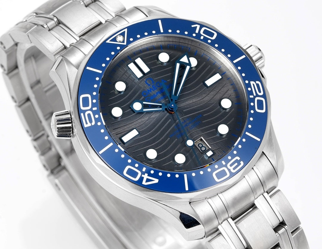 Omega watch close-up from side, blue dial and bezel, stainless bracelet links
