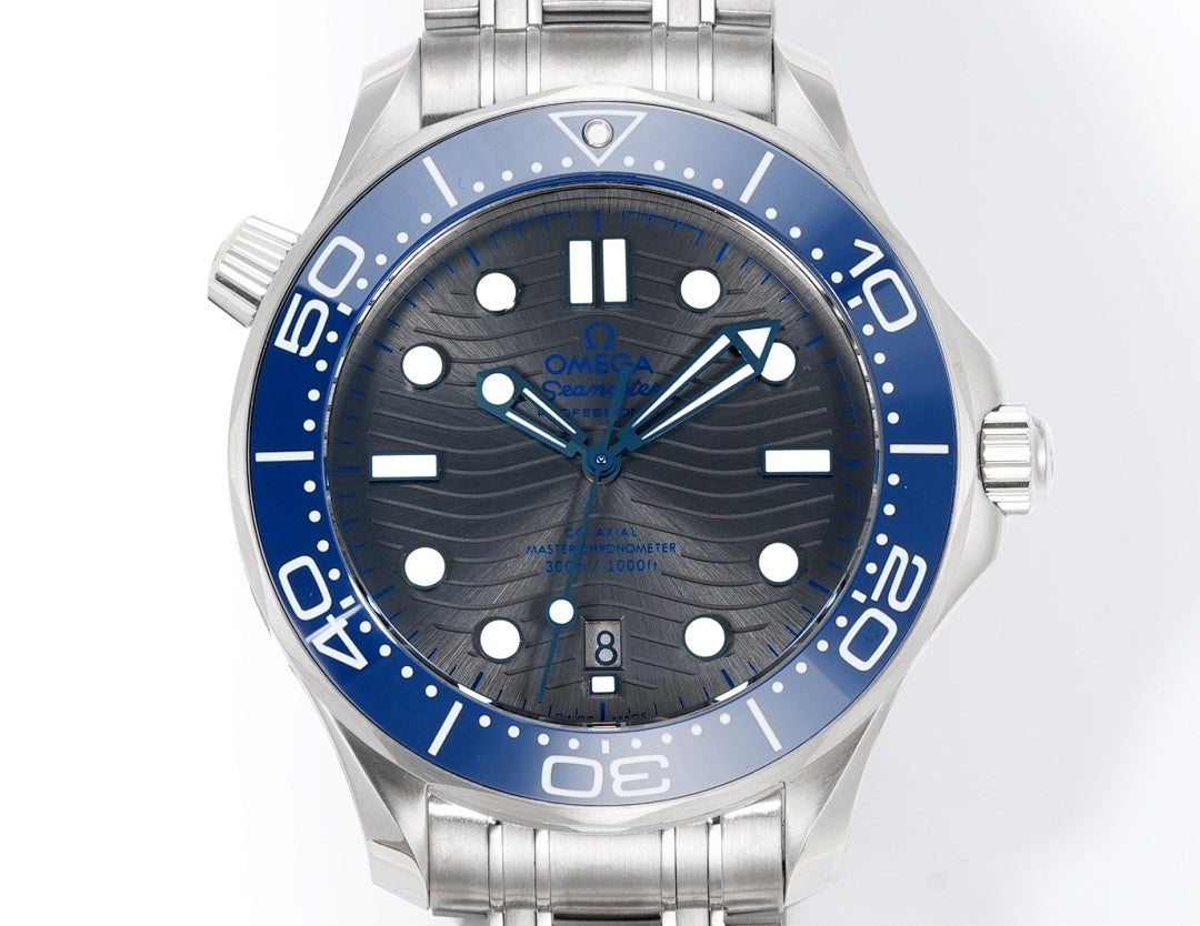 Omega watch front view, blue dial and bezel, silver stainless bracelet, baton markers