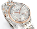 Angled wristwatch with silver bracelet, rose-gold bezel, light dial and Roman numerals