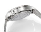 Stainless steel watch caseback with gray mesh bracelet and crown, close-up angle.
