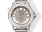 Stainless steel diver watch with silver dial, baton markers, and gray metal mesh bracelet.