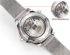 Stainless steel watch caseback with mechanical movement details and mesh strap