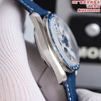 Omega Speedmaster watch side profile with polished metal case and blue fabric strap