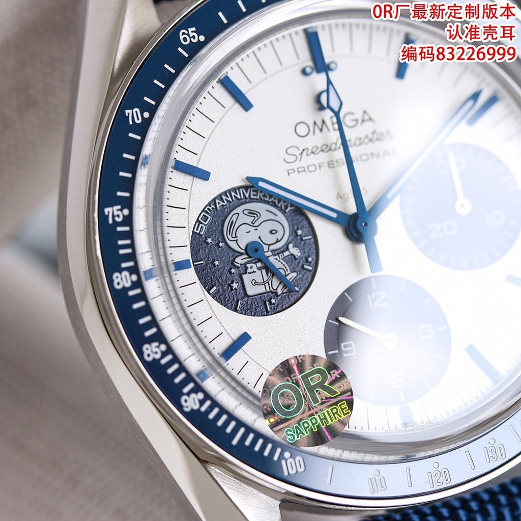 Omega Speedmaster dial close-up with blue accents, tachymeter bezel, and sapphire marker