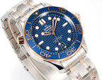 Wristwatch angled view with blue dial, silver steel bracelet, and rose-gold hands
