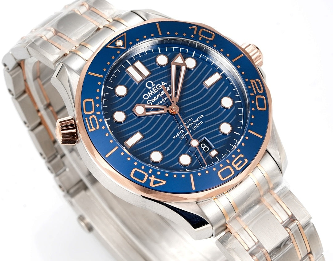 Wristwatch angled view with blue dial, silver steel bracelet, and rose-gold hands