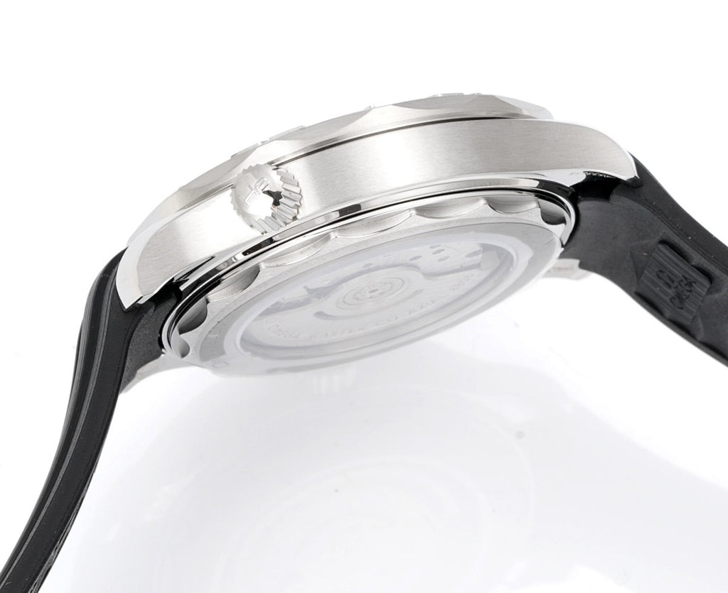 Omega watch caseback close-up with silver back and black rubber strap