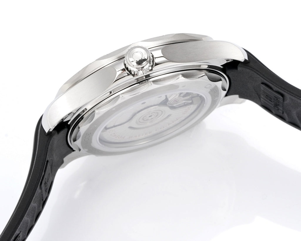 Omega watch caseback close-up with crown detail and black rubber strap