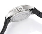 Omega watch caseback close-up with crown detail and black rubber strap